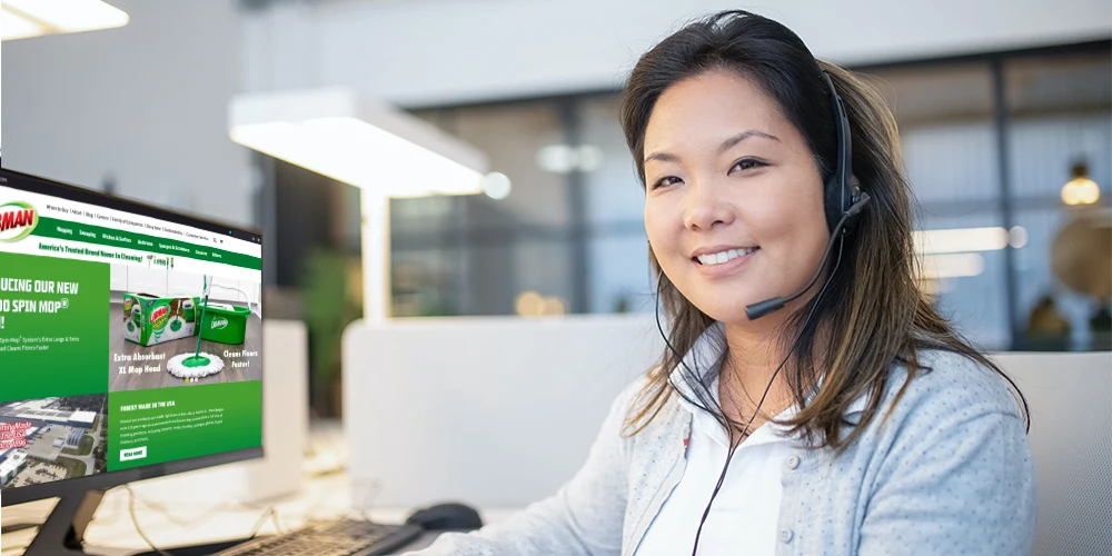 Woman at desk with headset on