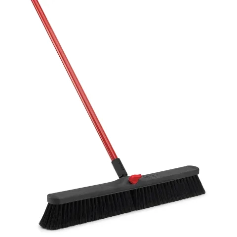 Push broom with a red handle and black fibers