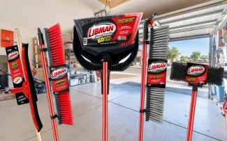 Array of cleaning tools in a garage